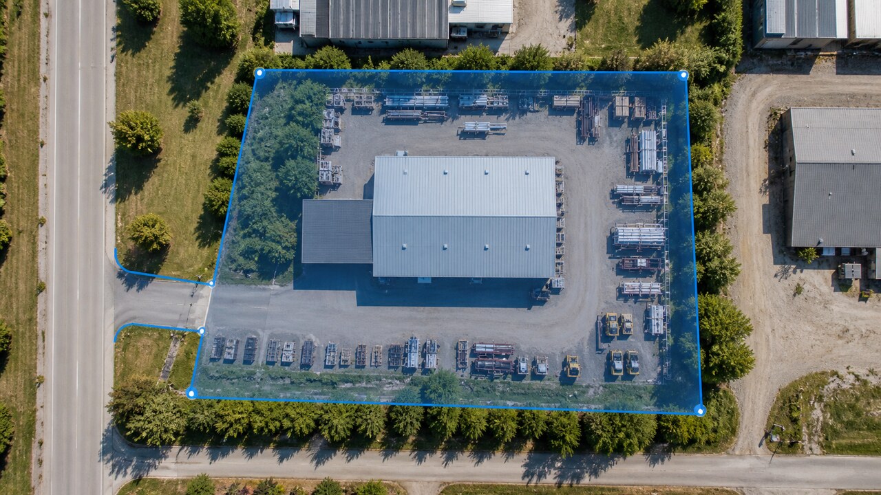 Aerial view of a storage yard outlined by a blue conceptual geofence